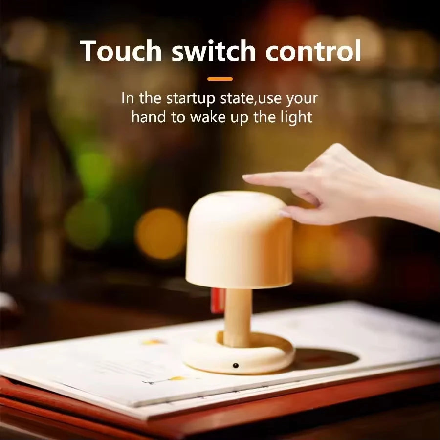 Touching the mushroom night lamp to switch it on