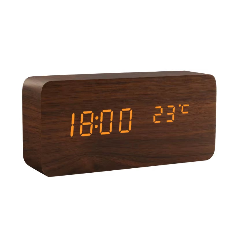 Rectangular brown wooden LED clock showing the temperature