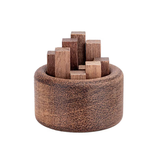 Round wooden fragrance diffuser filled with small wooden blocks