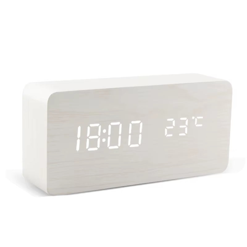Rectangular white wooden LED clock showing the temperature